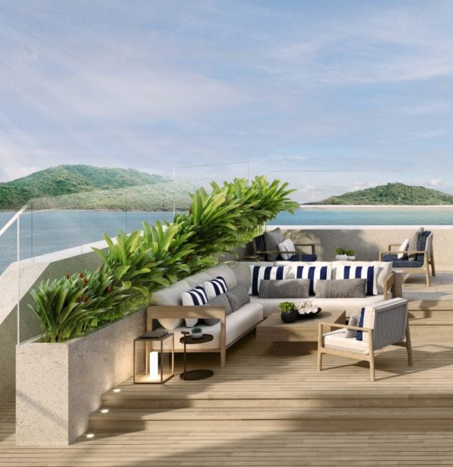 Outside ocean park sofa lounge area on decking with plants